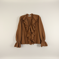 Blouse à jabots coupé bord franc