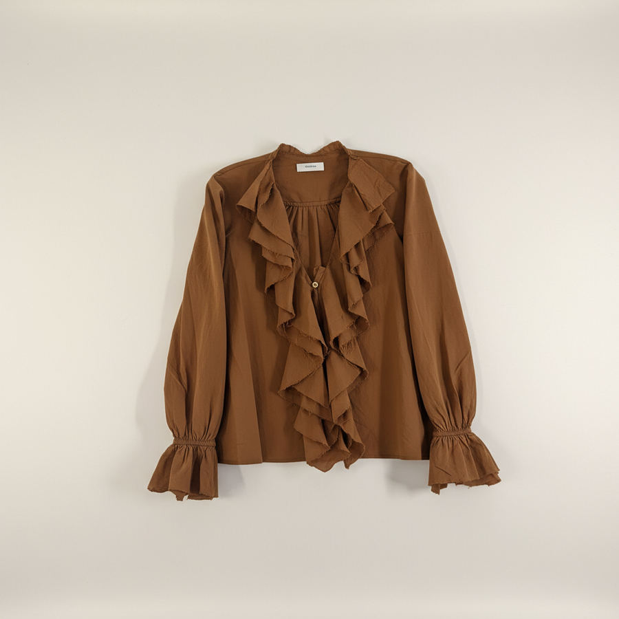 Blouse à jabots coupé bord franc