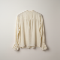 Blouse à jabots coupé bord franc